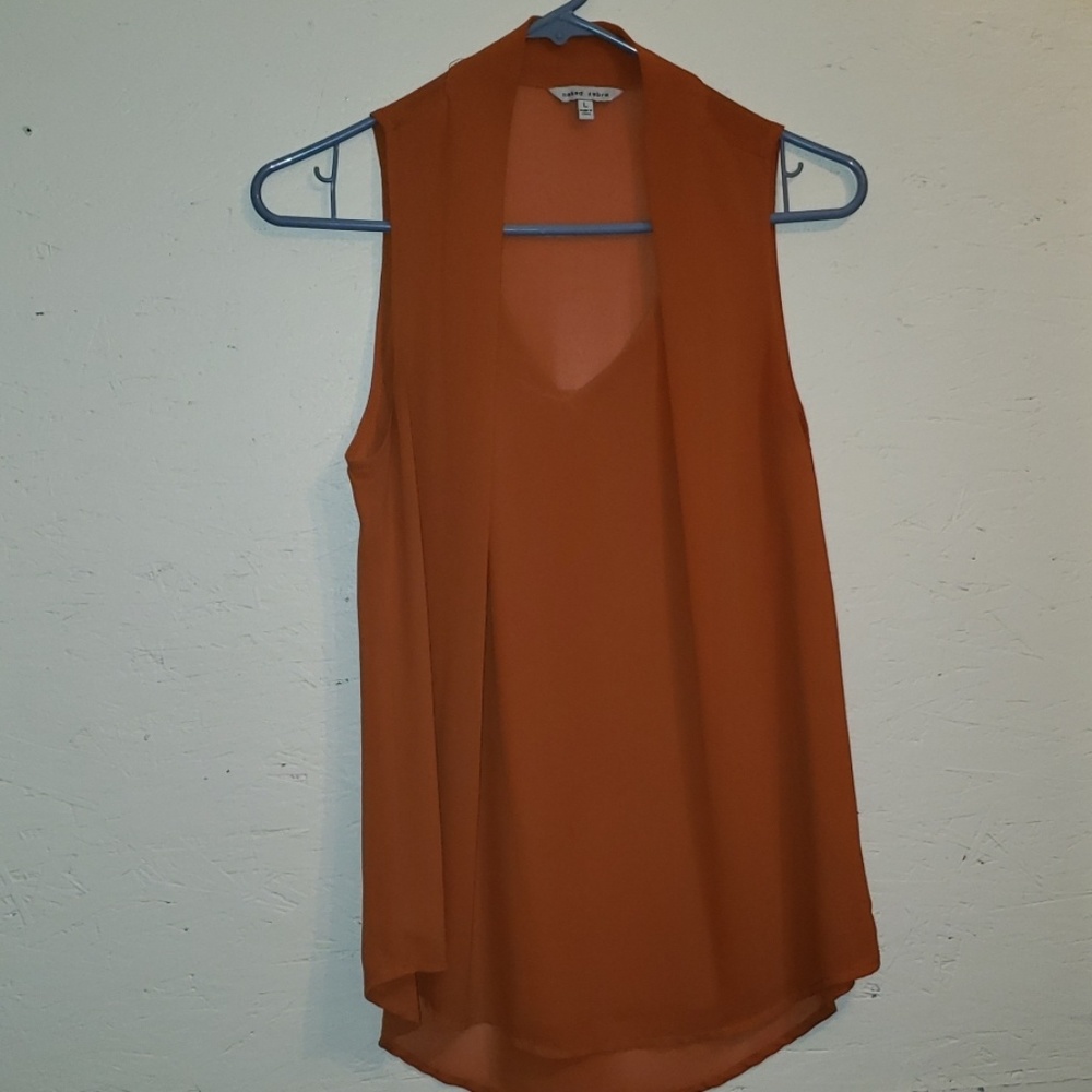 Orange sleeveless top